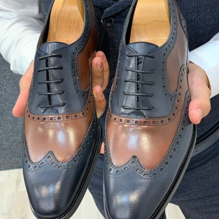 Men's black & tan leather oxford shoes with brogue punch